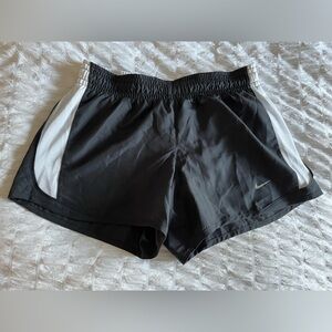 Black and white Nike running shorts